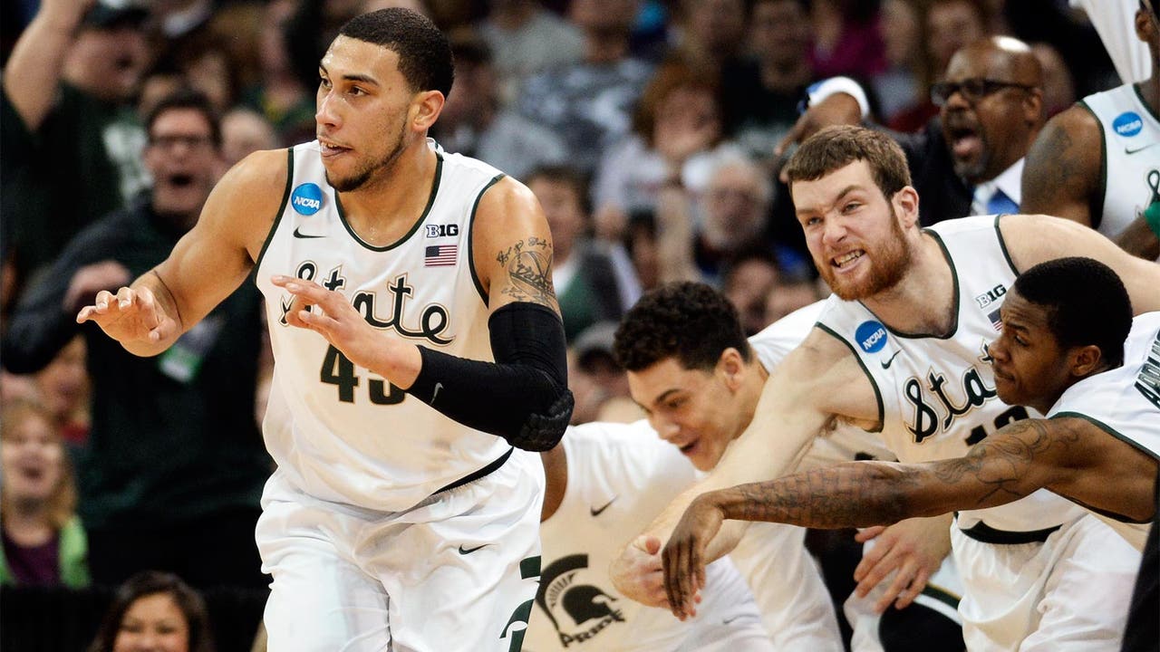 Michigan State holds off Harvard behind Branden Dawson's career night